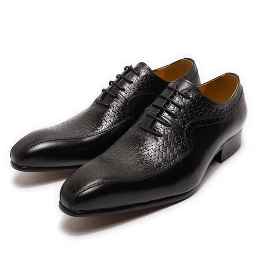 Black pointed toe men's dress shoes with textured leather and lace-up design