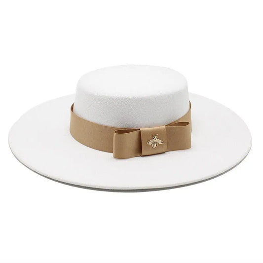White flat top fedora hat for women with beige French bowknot and bee brooch detail