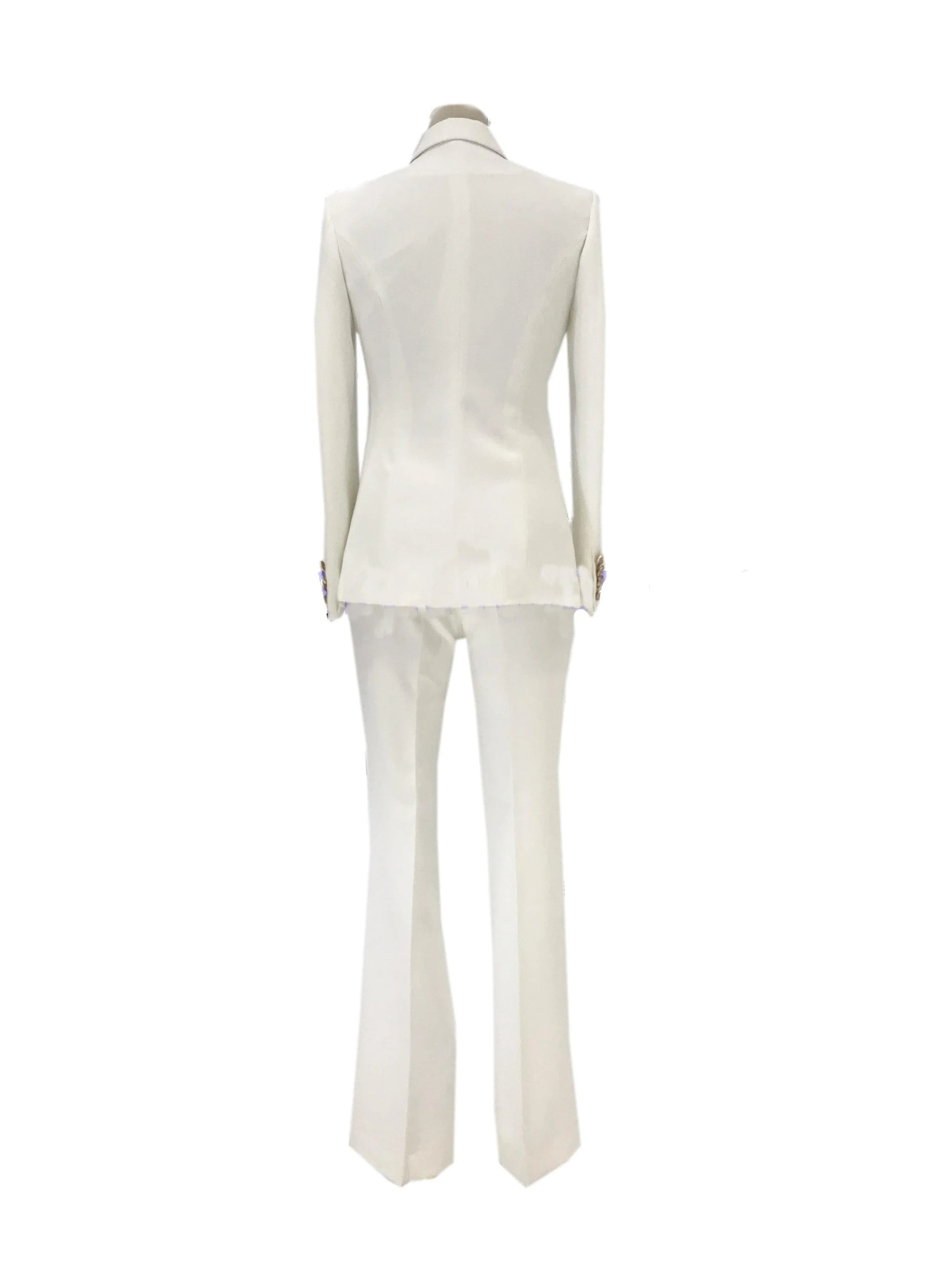 Back view of white double-breasted bell bottom pantsuit on mannequin