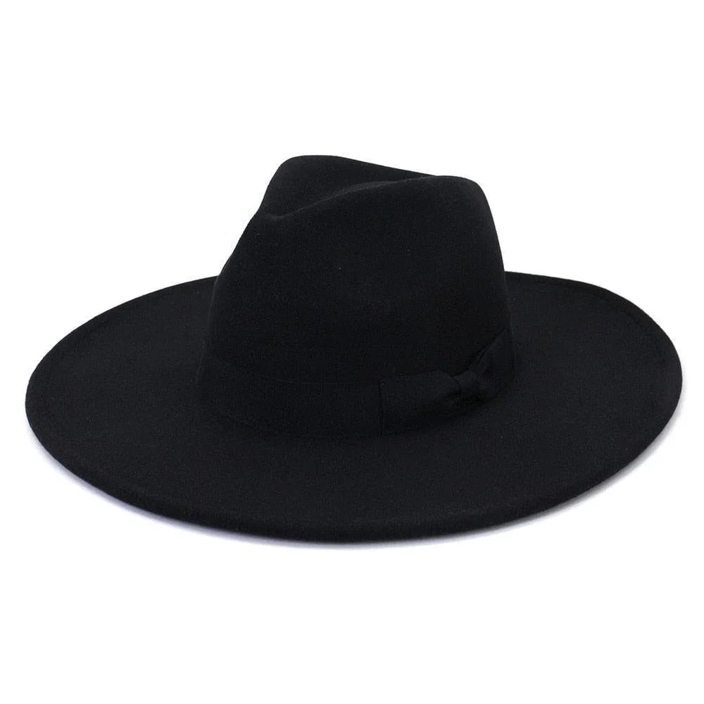 Black wide-brim retro fedora hat with ribbon band on white background