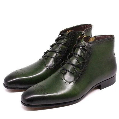 Green leather lace-up formal ankle boots with brogue detailing on a white background