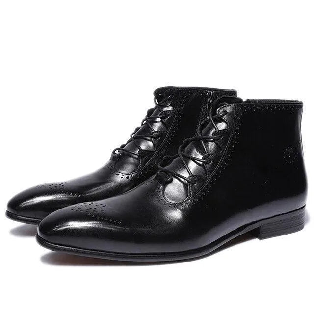 Black leather lace-up formal ankle boots with brogue detailing on a white background
