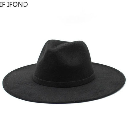 Classic black British style fedora hat with wide brim on white background