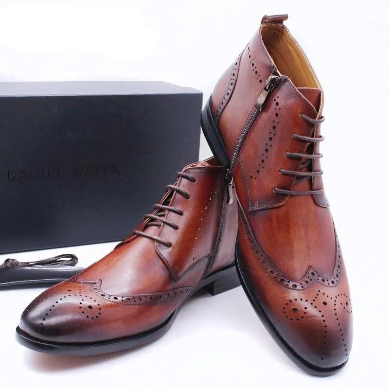 Brown formal leather ankle boots with brogue detailing and side zipper, stylish men's footwear