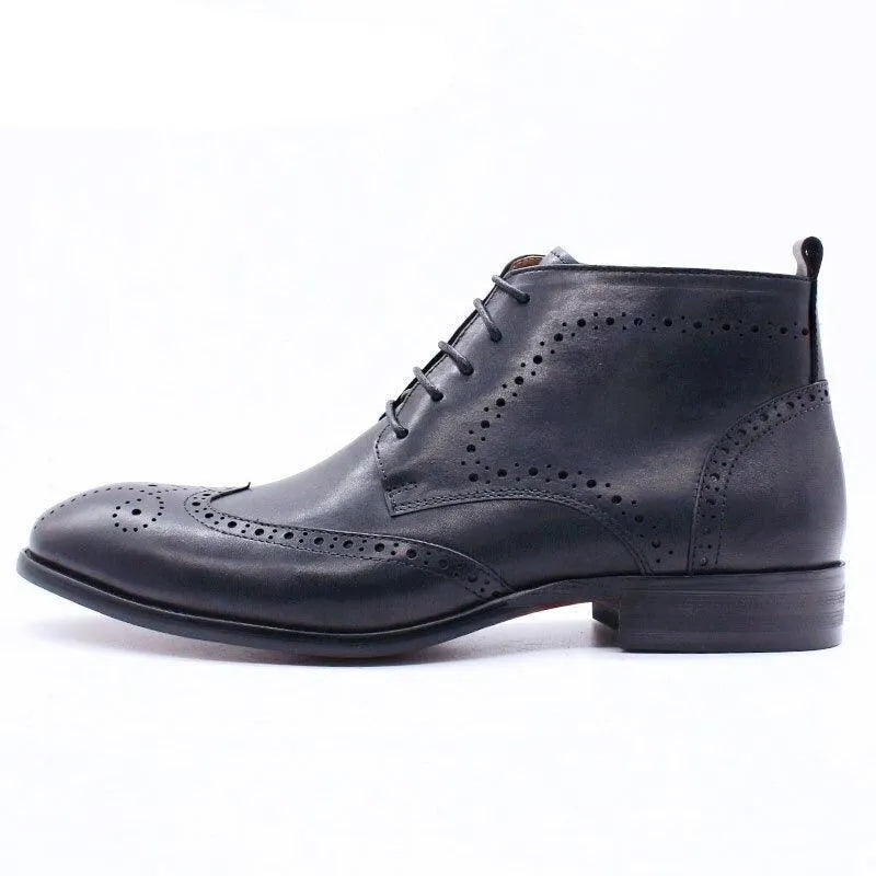 Black formal leather ankle boot with brogue detailing and lace-up design on white background