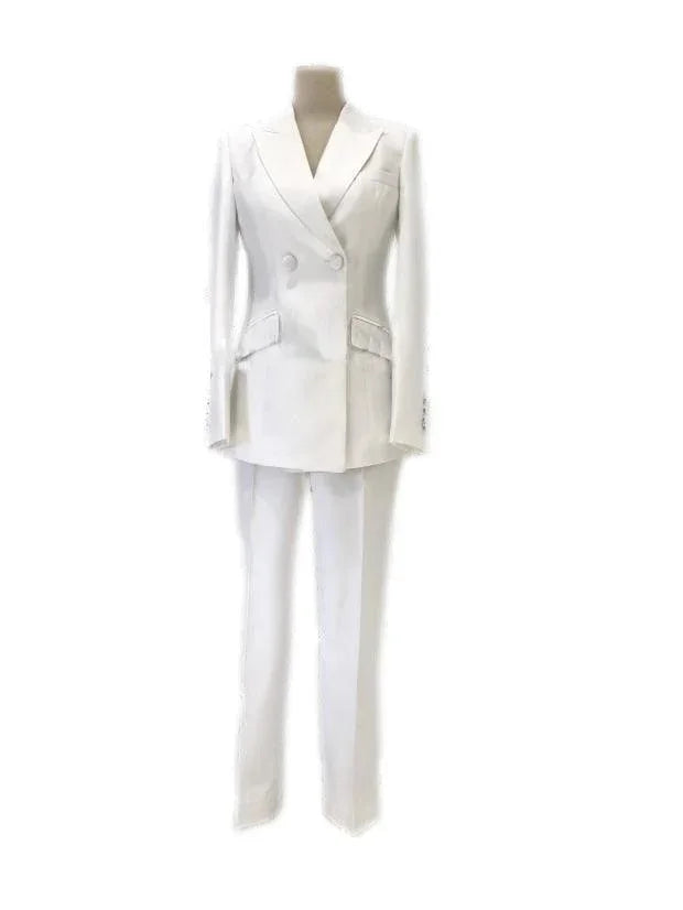 White double-breasted women's business pantsuit with trousers on mannequin