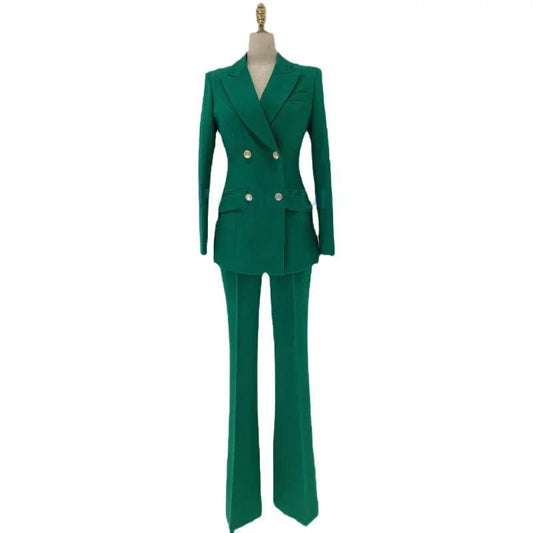 Green double-breasted women's formal pantsuit with blazer and flared trousers on mannequin