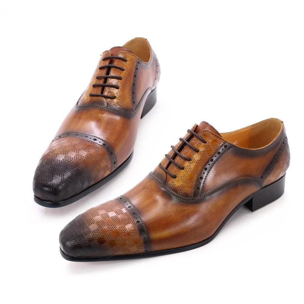 Men's brown leather lace-up dress shoes with cap toe and textured pattern on a white background