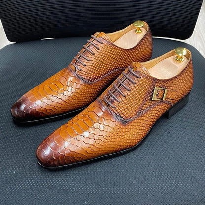 Brown python leather men's dress shoes with lace-up and buckle, displayed on a chair
