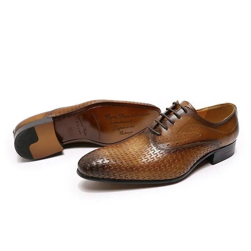 Brown woven leather dress shoes with pointed toe and lace-up design on white background.
