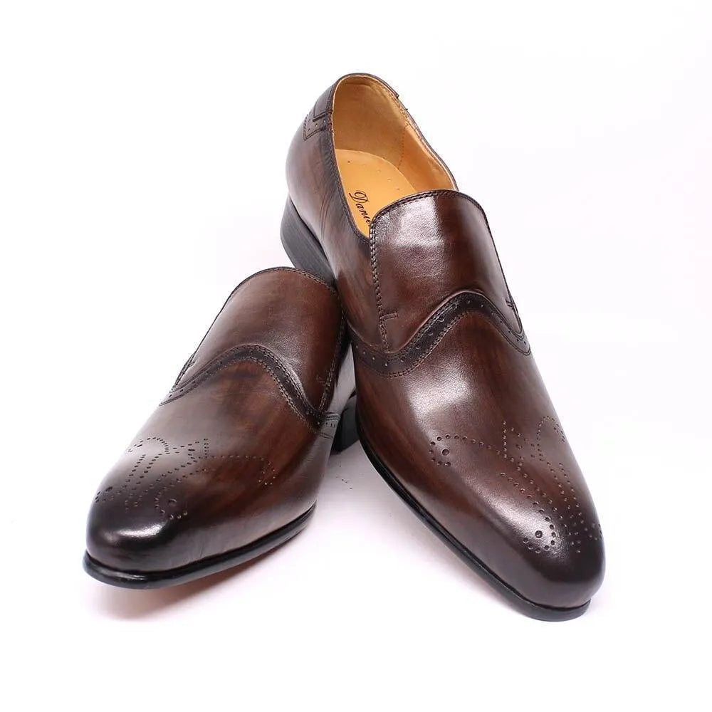 Brown leather pointed toe men's dress shoes with brogue detailing on white background