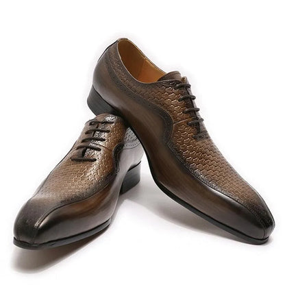 Brown pointed toe men's dress shoes with textured leather and lace-up design on white background