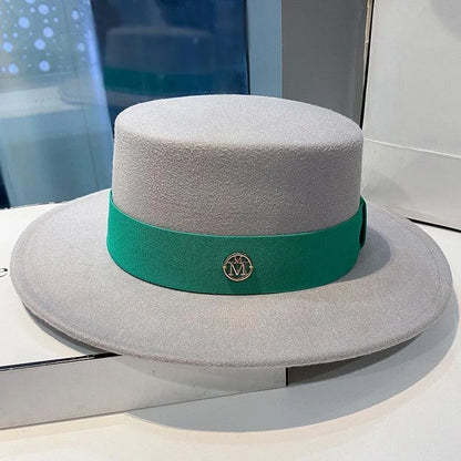 Elegant grey fedora hat for women with flat top and green band, stylish accessory