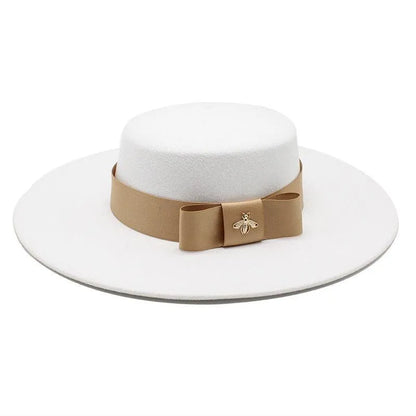 White flat top fedora hat for women with beige French bowknot and bee brooch detail
