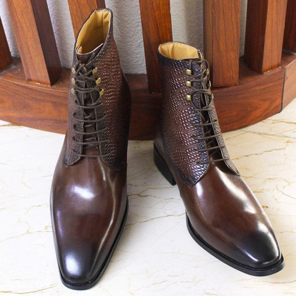 Men's brown leather ankle boots with textured upper, lace-up style on marble floor