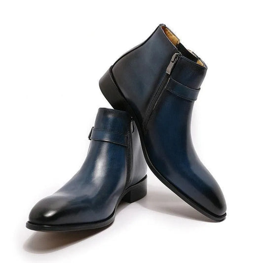 Men's navy blue leather ankle boots with side zippers on a white background
