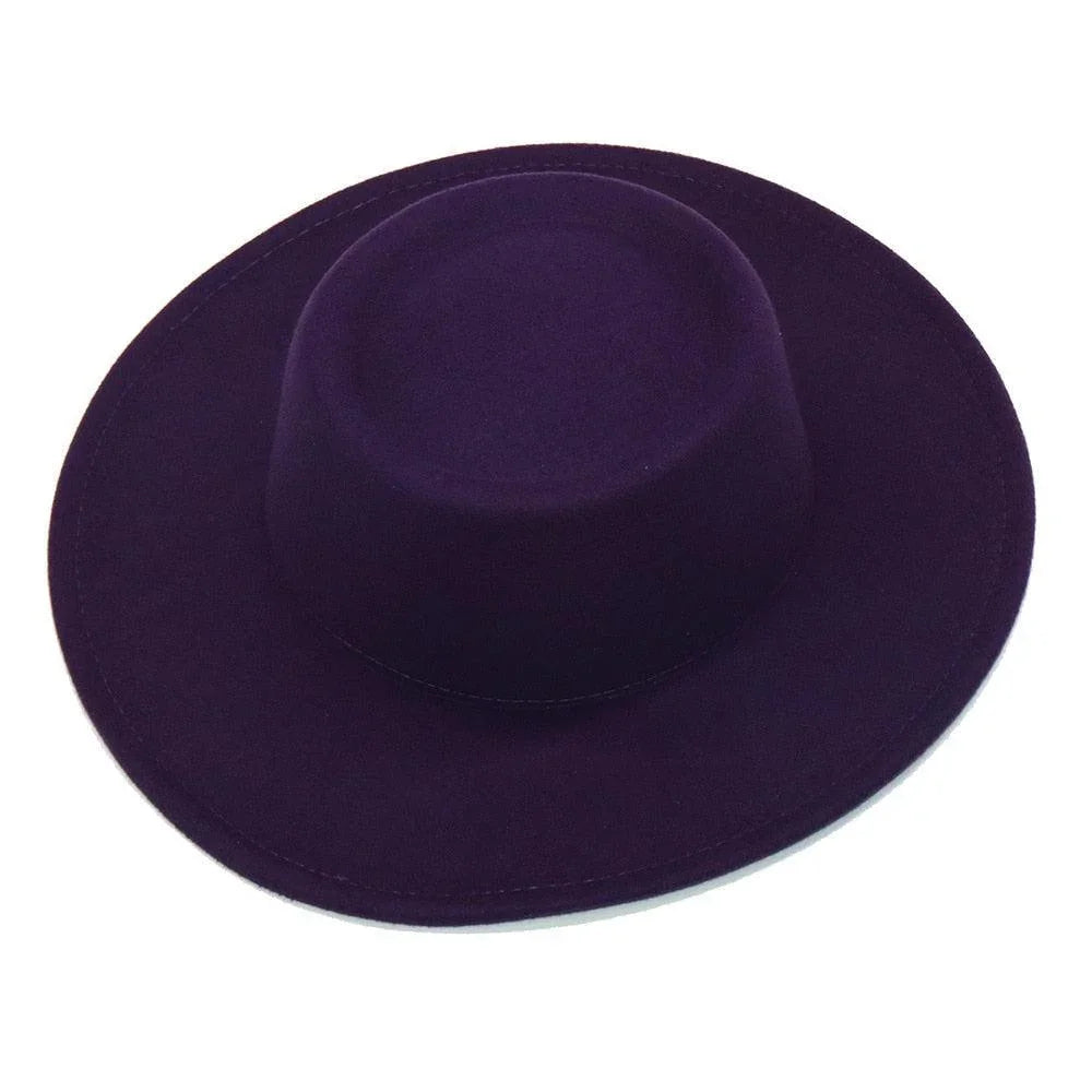 Purple fedora hat with wide brim on white background