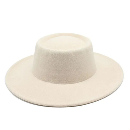 Beige wide-brim fedora hat with flat crown on white background
