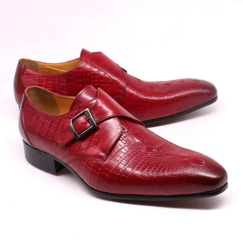Red men’s leather dress shoes with crocodile texture and buckle, formal footwear