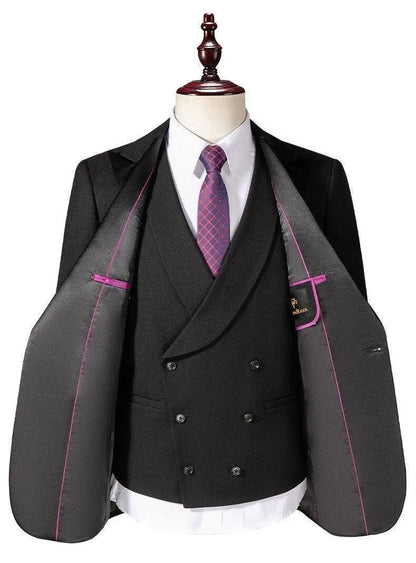 Men's black 3-piece tuxedo suit on mannequin with purple tie and pink lining