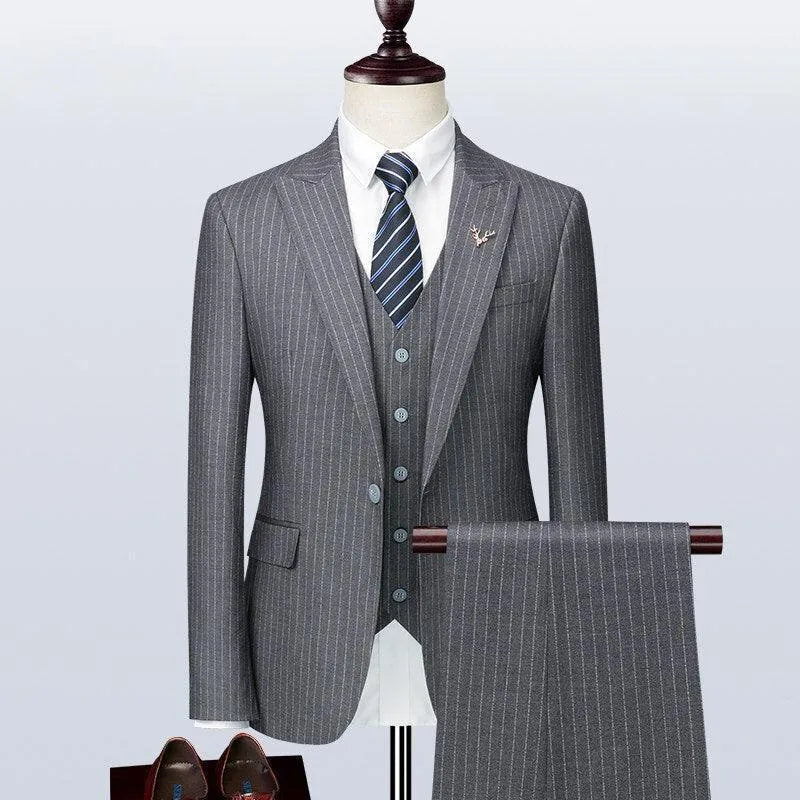 Gray pinstripe men's three-piece suit on mannequin with tie and dress shoes