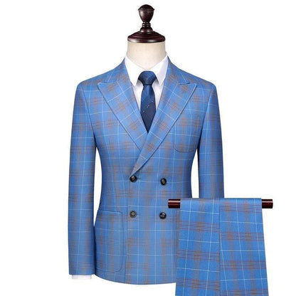 Men's blue plaid double-breasted suit with matching pants and tie on mannequin
