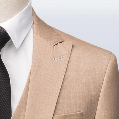 Camel three-piece men's suit with white shirt and black striped tie