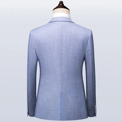 Back view of light blue men's suit jacket on mannequin, modern formal wear