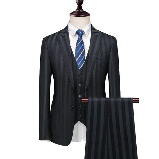 Men's black striped three-piece suit with blue tie on mannequin, displayed with matching pants.