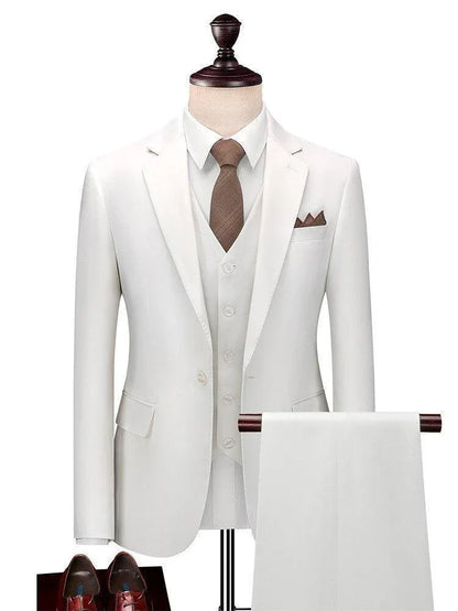 Men's white wedding 3-piece suit with brown tie and pocket square on mannequin
