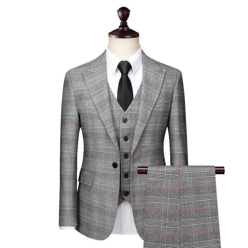 Gray plaid three-piece men's suit with white shirt and black tie on mannequin