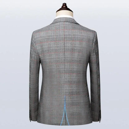 Back view of a gray plaid men's suit jacket on mannequin, classic tailored design
