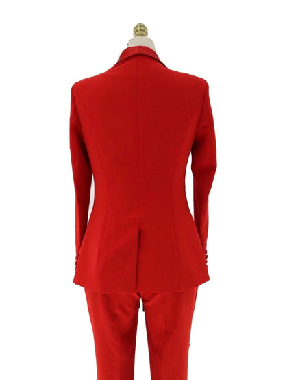 Back view of red satin lapel collar women's pant suit on mannequin
