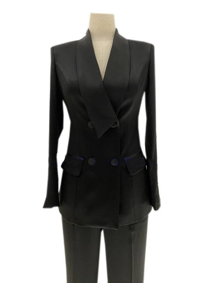 Satin black wide-leg double-breasted women’s pantsuit with blazer on mannequin