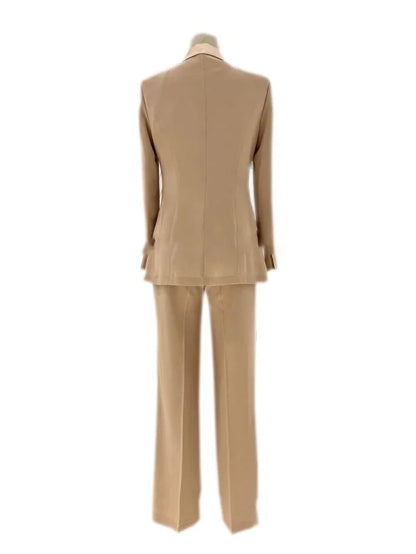 Back view of beige silk satin women's wedding pantsuit with blazer and trousers