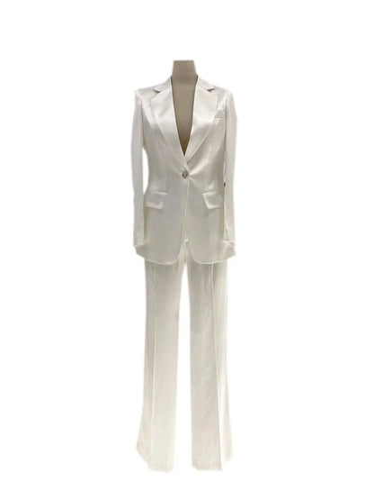 Silk satin white wedding pantsuit with blazer and trousers on mannequin
