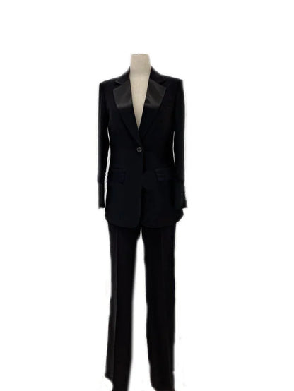 Black satin wedding pantsuit for women with blazer and trousers on mannequin