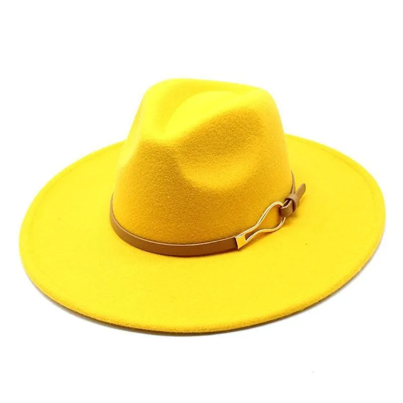 Yellow unisex felt fedora hat with brown band and wide brim on white background
